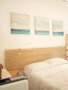 Кровать или кровати в номере Soffio Di Mare