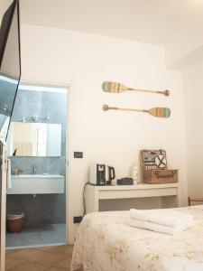 Кровать или кровати в номере Soffio Di Mare