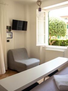 A television and/or entertainment centre at Soffio Di Mare