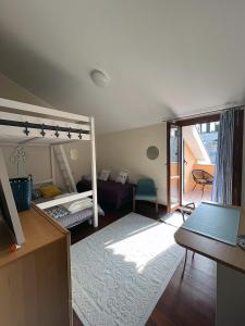 Krevet ili kreveti na sprat u jedinici u okviru objekta Nido Appartamento