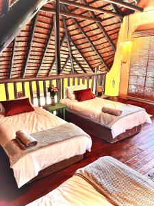 Cama ou camas em um quarto em Kruger River View