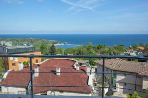 a view of the ocean from a balcony at Black sea Narcissus - quiet studio with amazing sea view in Varna City
