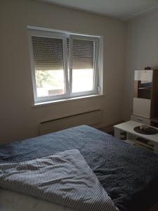Llit o llits en una habitació de Stančić kraj Morave