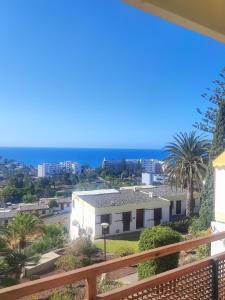 a view of the ocean from the balcony of a house at Casa panorama 314 San Agustín Maspalomas in San Agustin