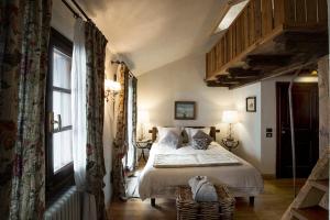 Postel nebo postele na pokoji v ubytování Locanda La Brenva - Estella Hotel Collection & Experience