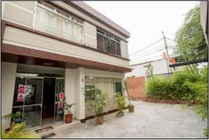 a building with plants in front of it at Nuevo Bamboo in Piura