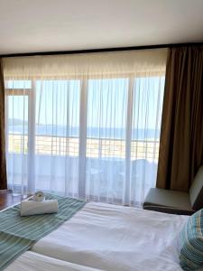 Postel nebo postele na pokoji v ubytování Sea View