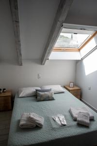 Ένα ή περισσότερα κρεβάτια σε δωμάτιο στο Holiday Lefkas Sunrise Luxury Appartments