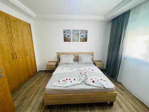 Postel nebo postele na pokoji v ubytování Luxus-Apartment mit Poolblick