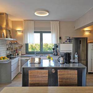 A kitchen or kitchenette at West Crete Chania - Villa Europa