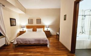 A bed or beds in a room at West Crete Chania - Villa Europa