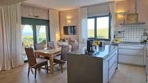 A kitchen or kitchenette at West Crete Chania - Villa Europa
