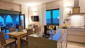 A kitchen or kitchenette at West Crete Chania - Villa Europa