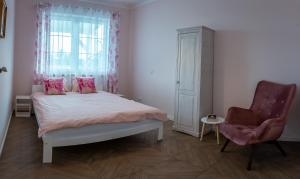 Postel nebo postele na pokoji v ubytování Lakeside Home