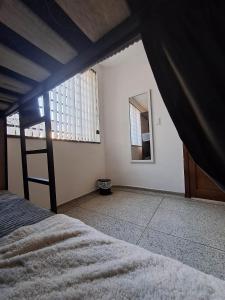 Voodi või voodid majutusasutuse Makarena Hostel toas