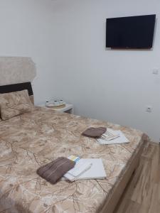 Postel nebo postele na pokoji v ubytování Apartmani "Helena"