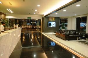 A television and/or entertainment centre at Hotel Sfera