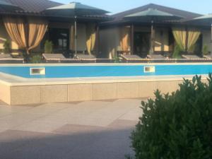 Piscine de l'établissement SUNRISE Cottage ou située à proximité