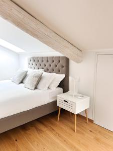 Postel nebo postele na pokoji v ubytování La Loggia dei Conti