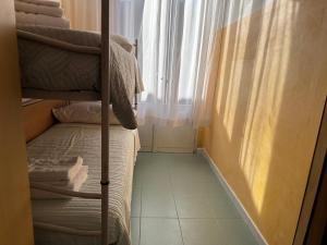 Postel nebo postele na pokoji v ubytování Hotel Montebello Riccione
