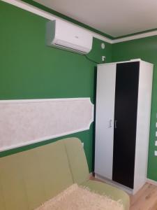 Postel nebo postele na pokoji v ubytování Apartmani "Helena"