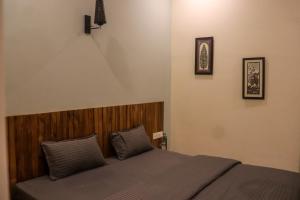 Letto o letti in una camera di Tavāsmi