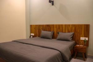 Letto o letti in una camera di Tavāsmi