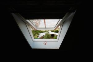 B&B Hullebrug في هيست-اوب-دين-بيرغ: منظر علوي لنافذة في مبنى