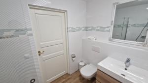Koupelna v ubytování Kivi Residence + 34 fotografií