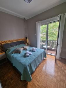 Postel nebo postele na pokoji v ubytování Piraeus open view Appartment