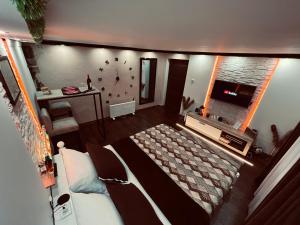 Una cama o camas en una habitación de Apartman Podroom