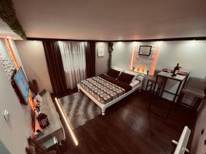 Una cama o camas en una habitación de Apartman Podroom