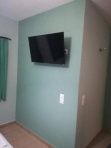 TV a/nebo společenská místnost v ubytování Vasileiou