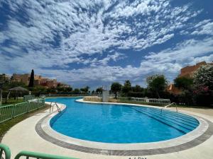 Bazén v ubytovaní Xposure beach apartment alebo v jeho blízkosti