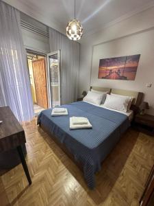 Ένα ή περισσότερα κρεβάτια σε δωμάτιο στο Agnanti Apartment