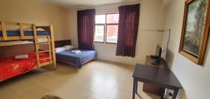 Katil atau katil-katil dalam bilik di Residencial Waldorf +11 gambar