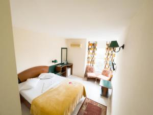 Postel nebo postele na pokoji v ubytování Hotel Majestic Olimp All Inclusive
