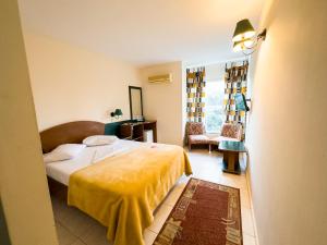 Postel nebo postele na pokoji v ubytování Hotel Majestic Olimp All Inclusive