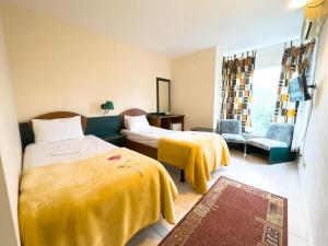 Postel nebo postele na pokoji v ubytování Hotel Majestic Olimp All Inclusive