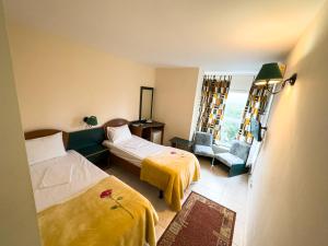 Postel nebo postele na pokoji v ubytování Hotel Majestic Olimp All Inclusive