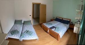 Postel nebo postele na pokoji v ubytování Piano B