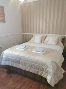 Postel nebo postele na pokoji v ubytování Green Apple Guesthouse