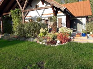 Zahrada ubytování Apartament pod brzozami -Tomaszkowo
