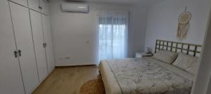 Postel nebo postele na pokoji v ubytování Casa adosada Gran Avenida con billar