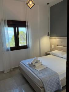 Postel nebo postele na pokoji v ubytování Apartment & Studios Haido