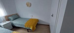 Postel nebo postele na pokoji v ubytování Casa adosada Gran Avenida con billar
