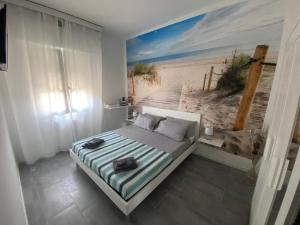 Postel nebo postele na pokoji v ubytování b&b Casa Balai 72 a 100 mt dal mare