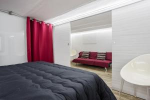 Posteľ alebo postele v izbe v ubytovaní Calypso Il Binario Elegance