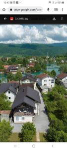 a picture of a house with a view of a town at VILLA Maatoug in Bihać