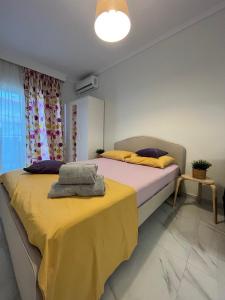 Posteľ alebo postele v izbe v ubytovaní Niki studios 1